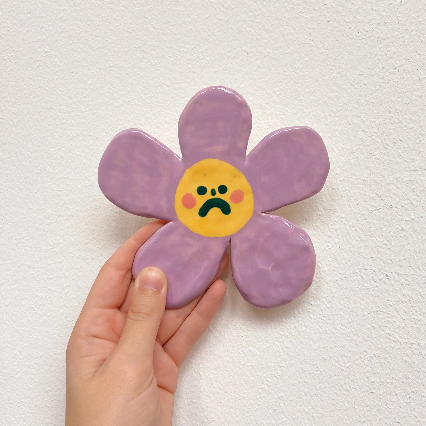 wall flower | sad purple flower