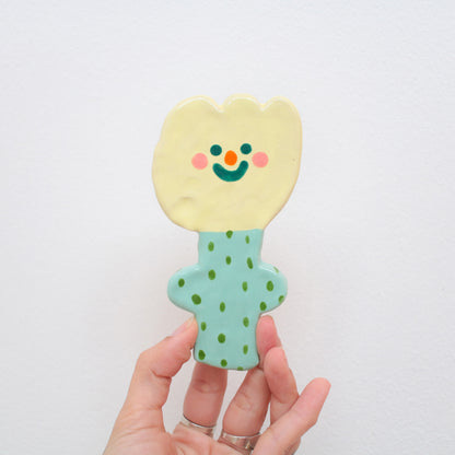 wall flower | little yellow bud